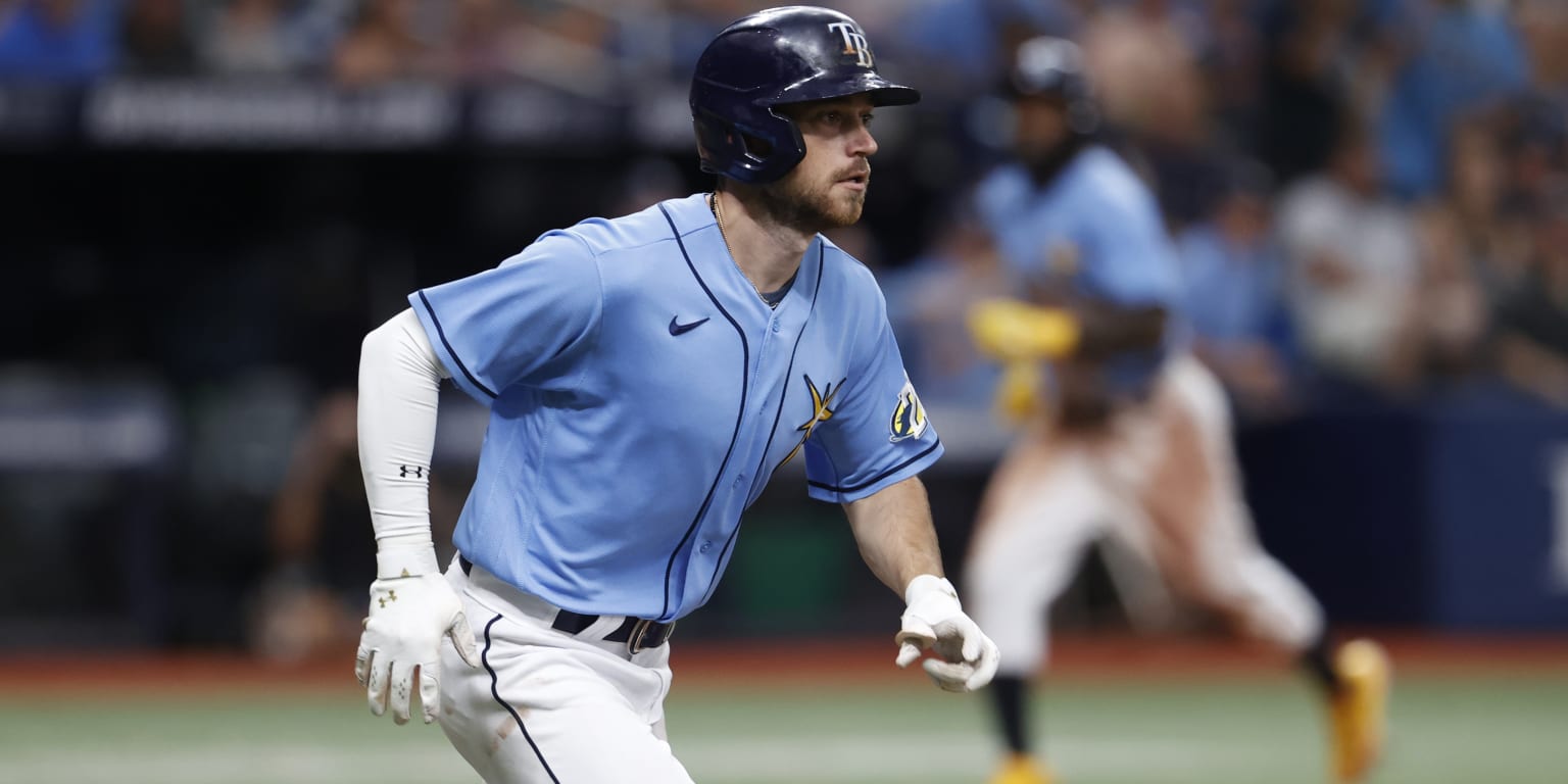 Tampa Bay Rays' Brandon Lowe throws his helmet after striking out