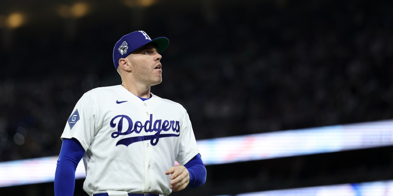 Dodgers activate Freeman from paternity list, option Ward