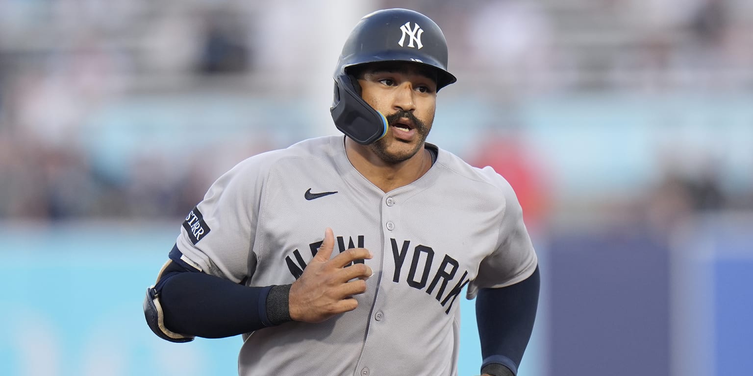 Grisham accepts qualifying offer from Yankees