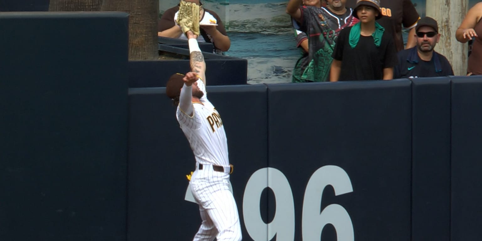 Merrill hits wall hard on outstanding first-inning catch