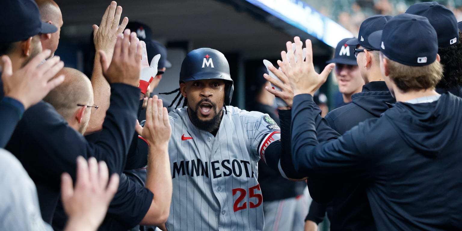 Buxton's 20th homer backs Twins' bullpen effort