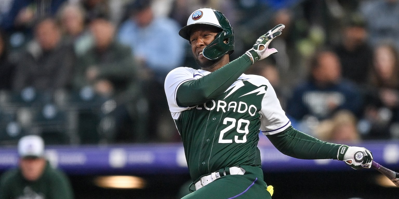 Rockies score 11 runs at Coors Field without a home run in win