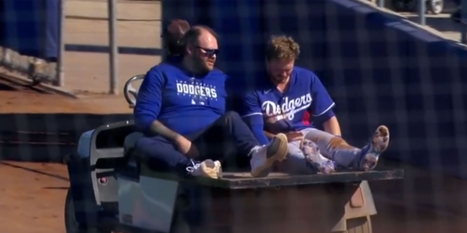 Dodgers' Gavin Lux exits with injury after slamming into wall