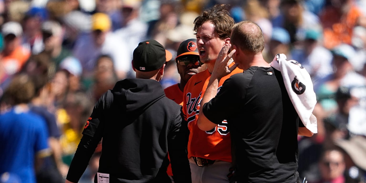 Rutschman exits game after being hit by throw on left ear
