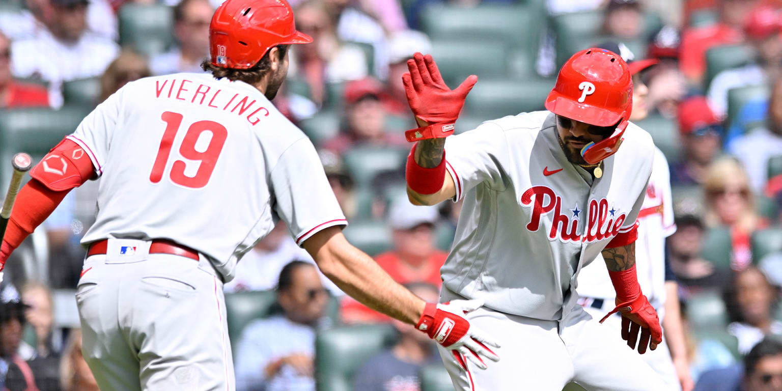 Philadelphia Phillies - Alec Bohm hugging Garrett Stubbs in the