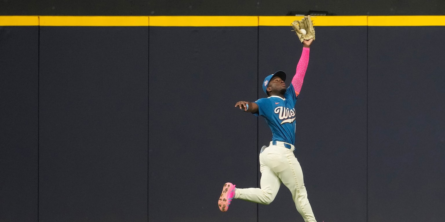 Saving the game with a wall-crashing catch? Just another day for 'Air Lara' 
