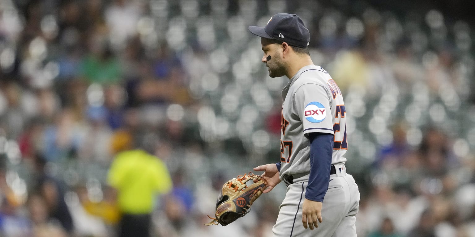 Houston Astros' Jose Altuve after not being able to throw out Los