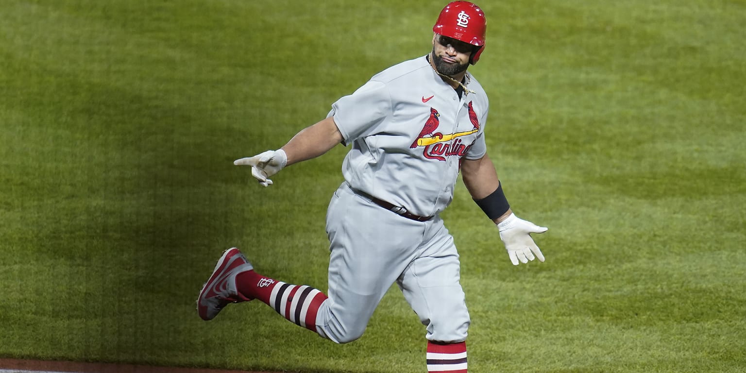 Albert Pujols is on fire reaching 703 homers and 2,216 RBIs