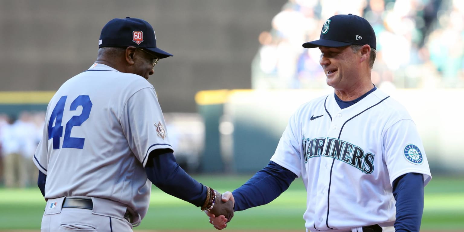 Seattle Mariners manager Scott Servais looks on in a City Connect