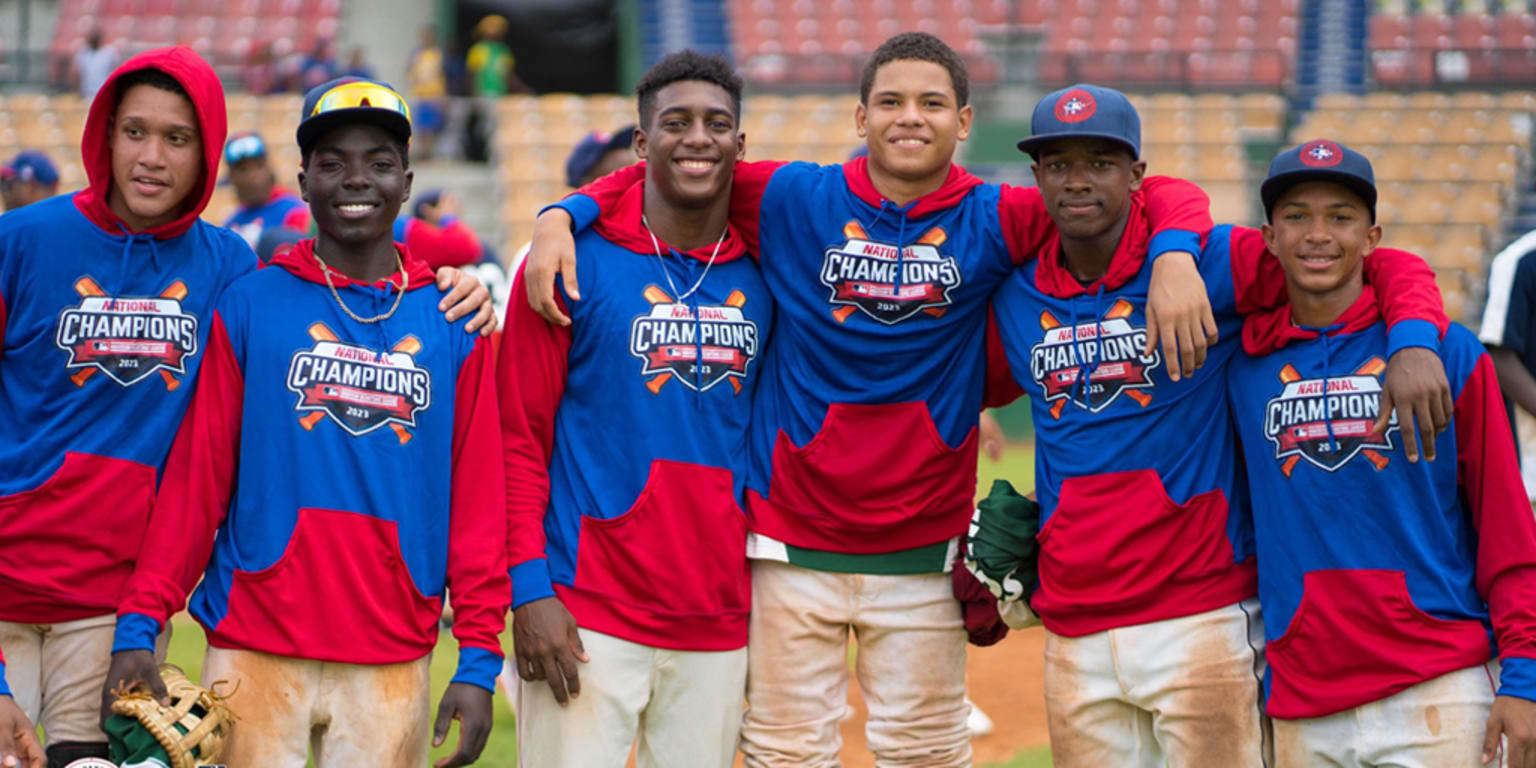 Dominican champion Juan Guzman, right, connects with a right