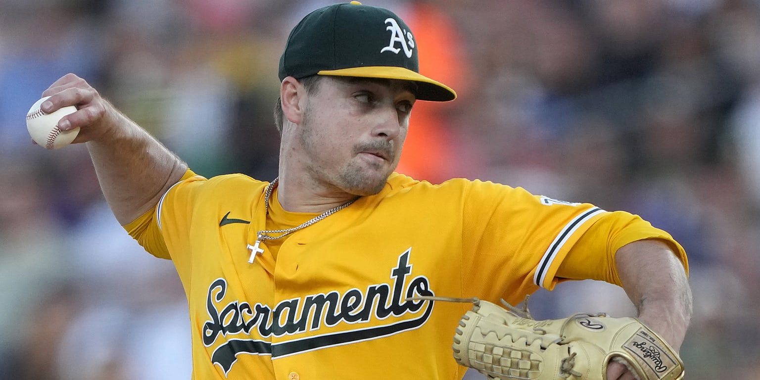 A's walk tightrope but hold on vs. Yanks after Ginn's gem