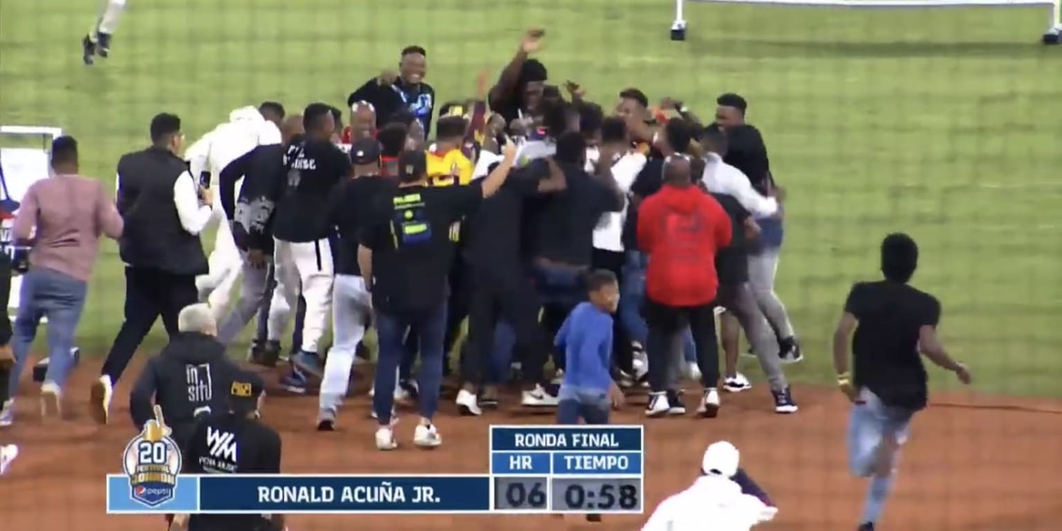 Fans storm field after Acuña wows crowd