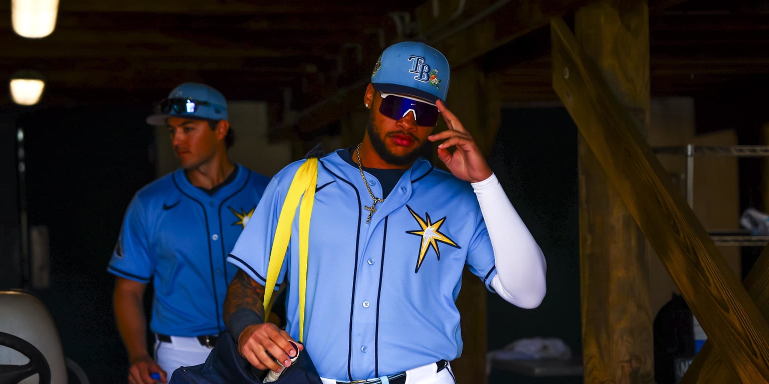 Rays celebrate as Isaac returns to field -- and singles -- after brain surgery