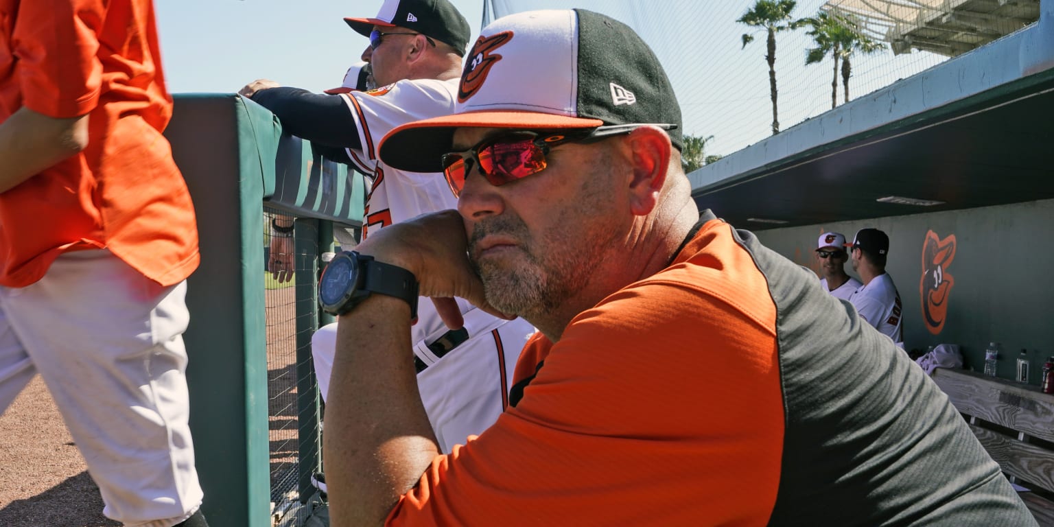 Pitcher Mychal Givens throws during the first day of workouts for pitchers  and catchers for the 2023 major league season at the Baltimore Orioles'  spring training facility. – The Denver Post