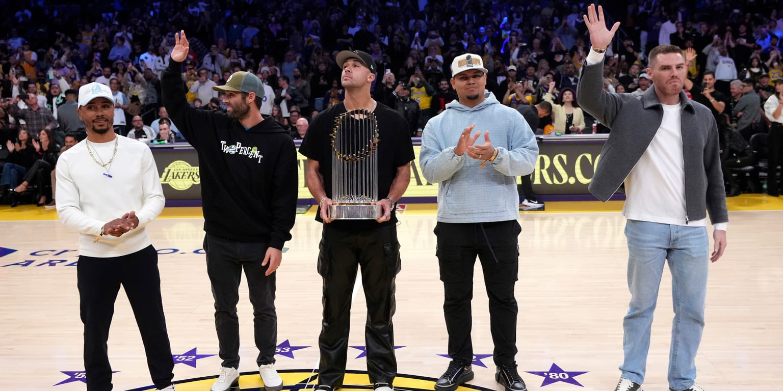 LA love: Dodgers visit Lakers with World Series trophy