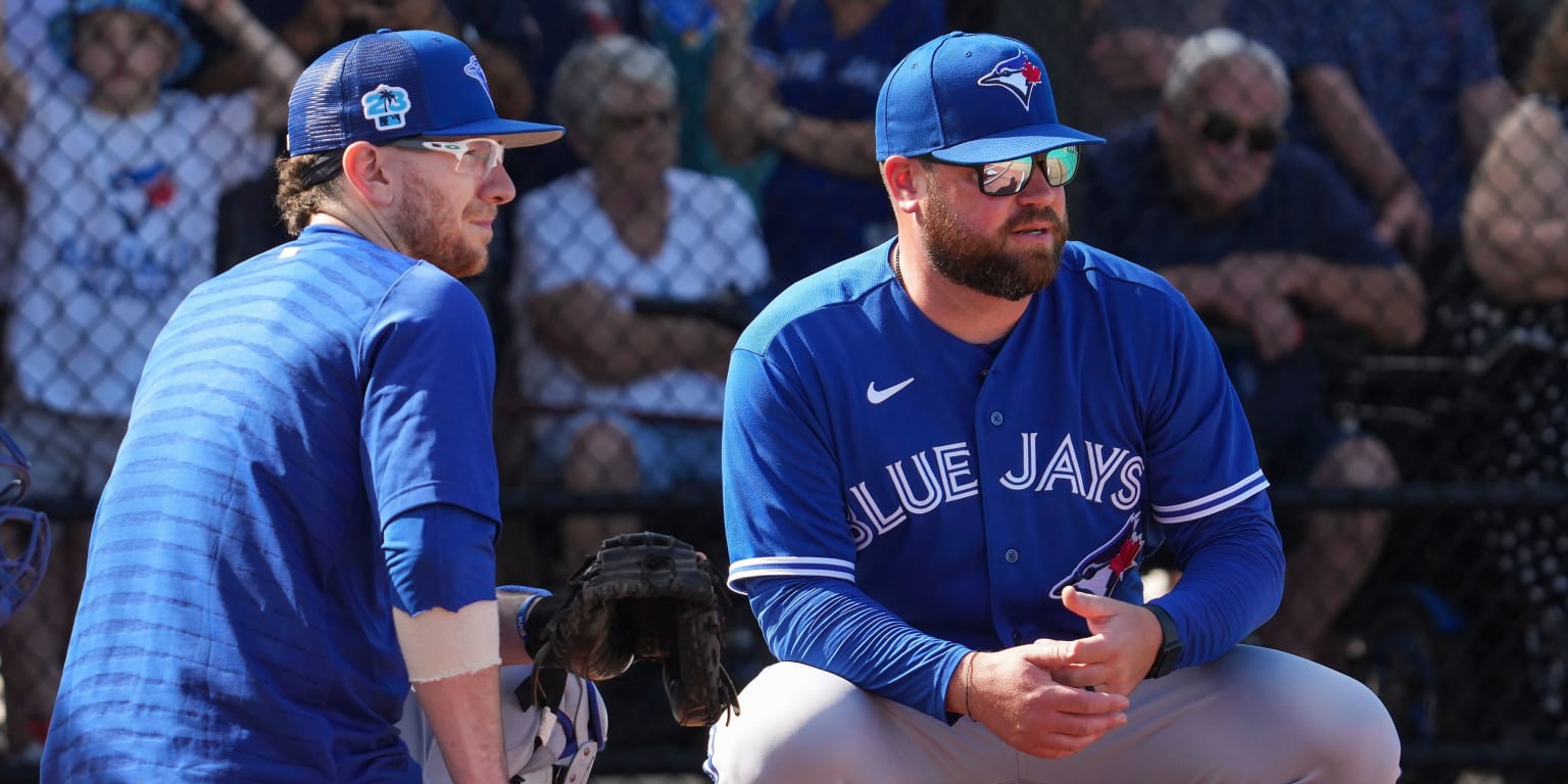 ST. PETERSBURG, FL - MAY 15: Toronto Blue Jays catcher Alejandro Kirk (30)  celebrates his double with his teammates in the dugout during the MLB  regular season game between the Toronto Blue