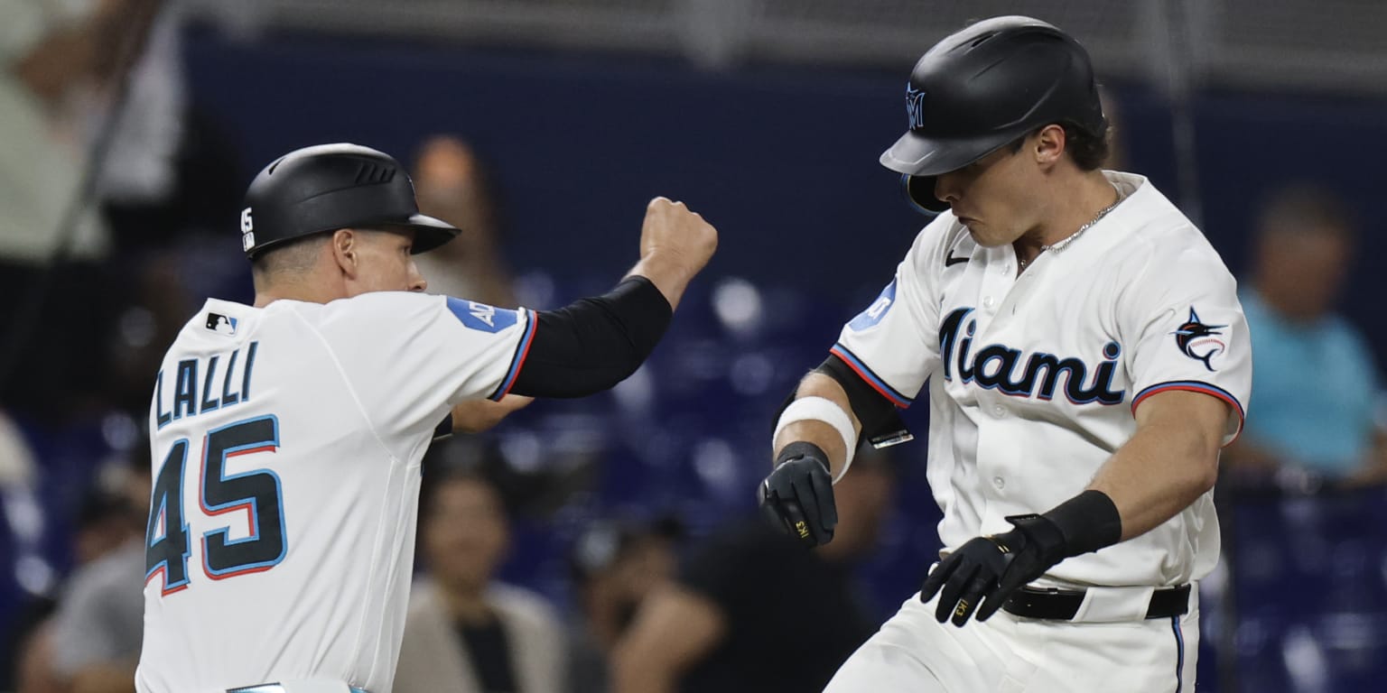 Conine, Norby come up big in Marlins' win over Reds