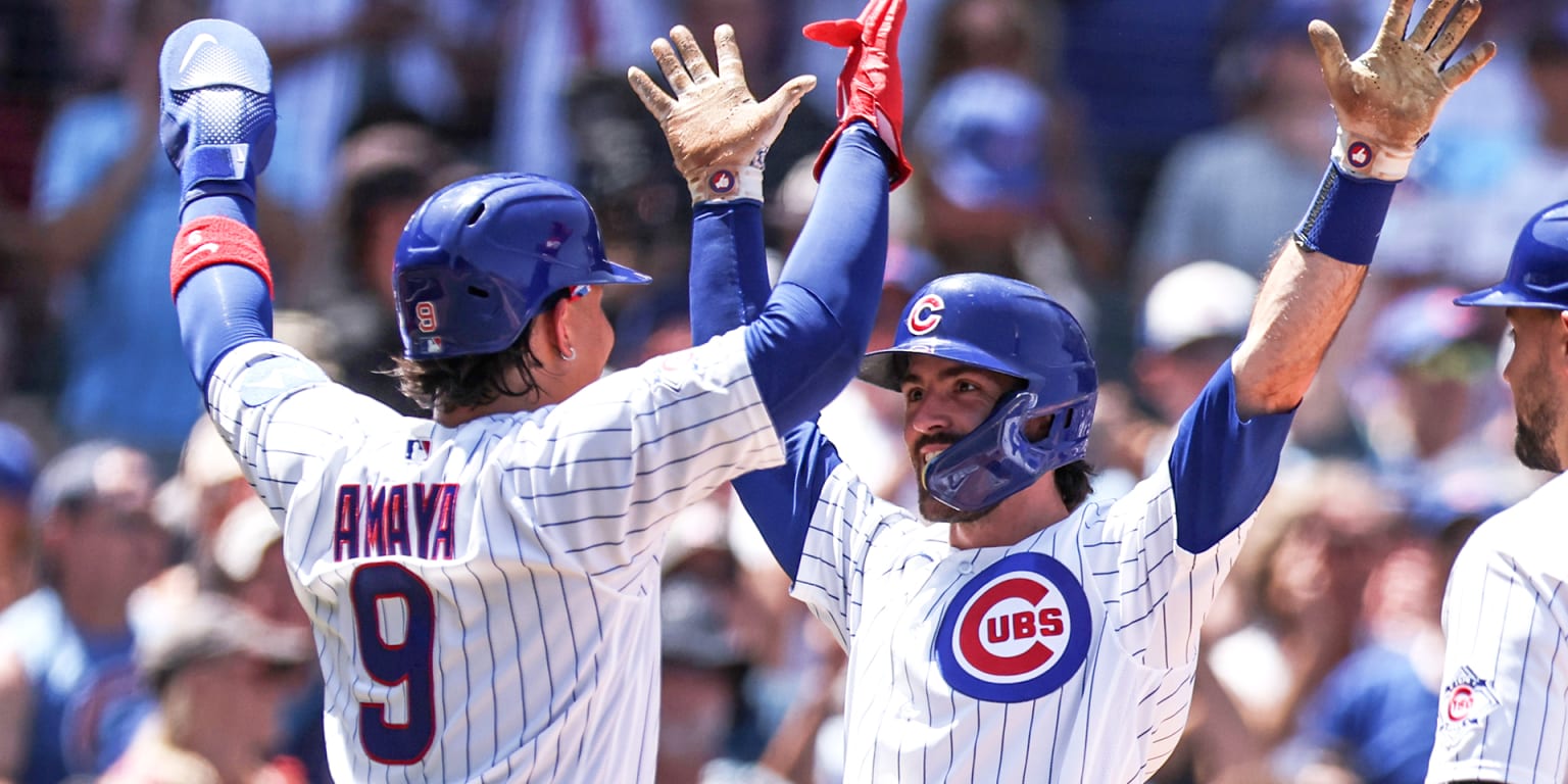 Swanson slugs 3 HRs in Cubs' 23-run, 8-HR romp
