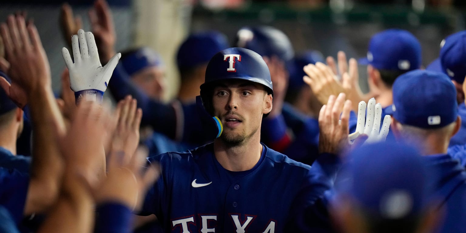 At Texas Rangers spring training, prospects lean on vets to set