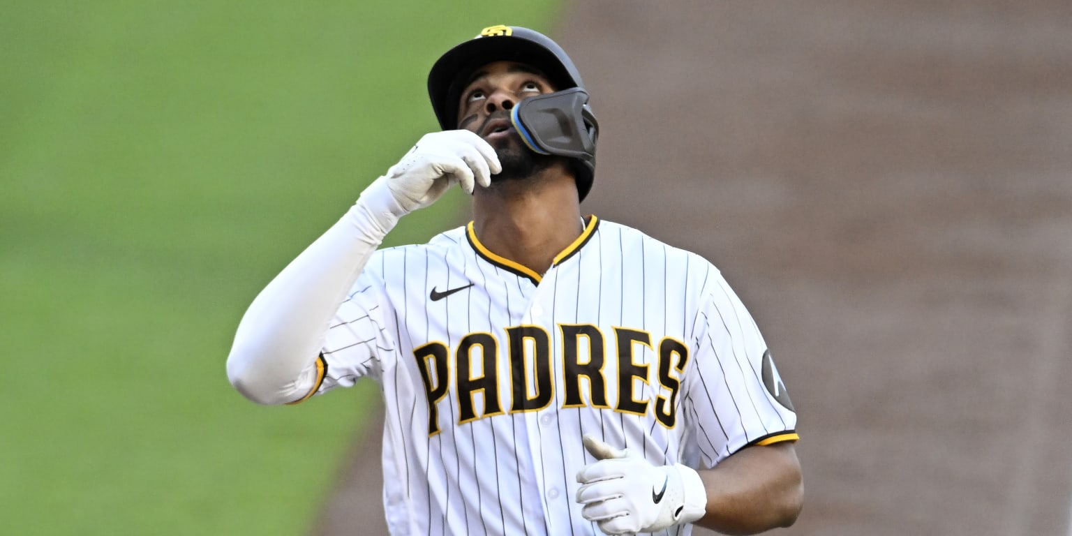 San Diego Padres' Xander Bogaerts takes off his batting gloves after  striking out during at bat against the Cleveland Guardians in a baseball  game Tuesday, June 13, 2023, in San Diego. (AP