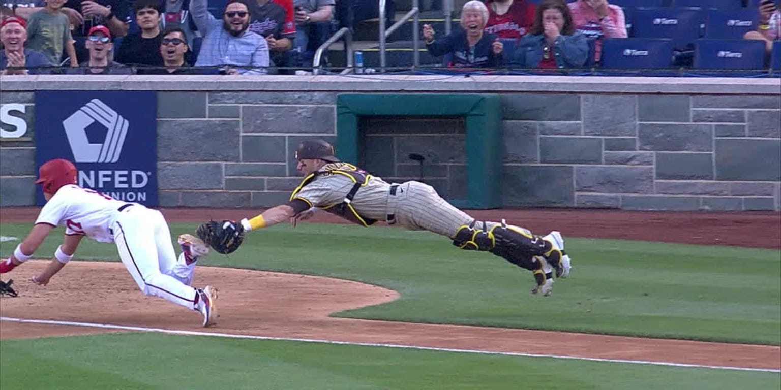 San Diego Padres catcher Brett Sullivan turns after catching a