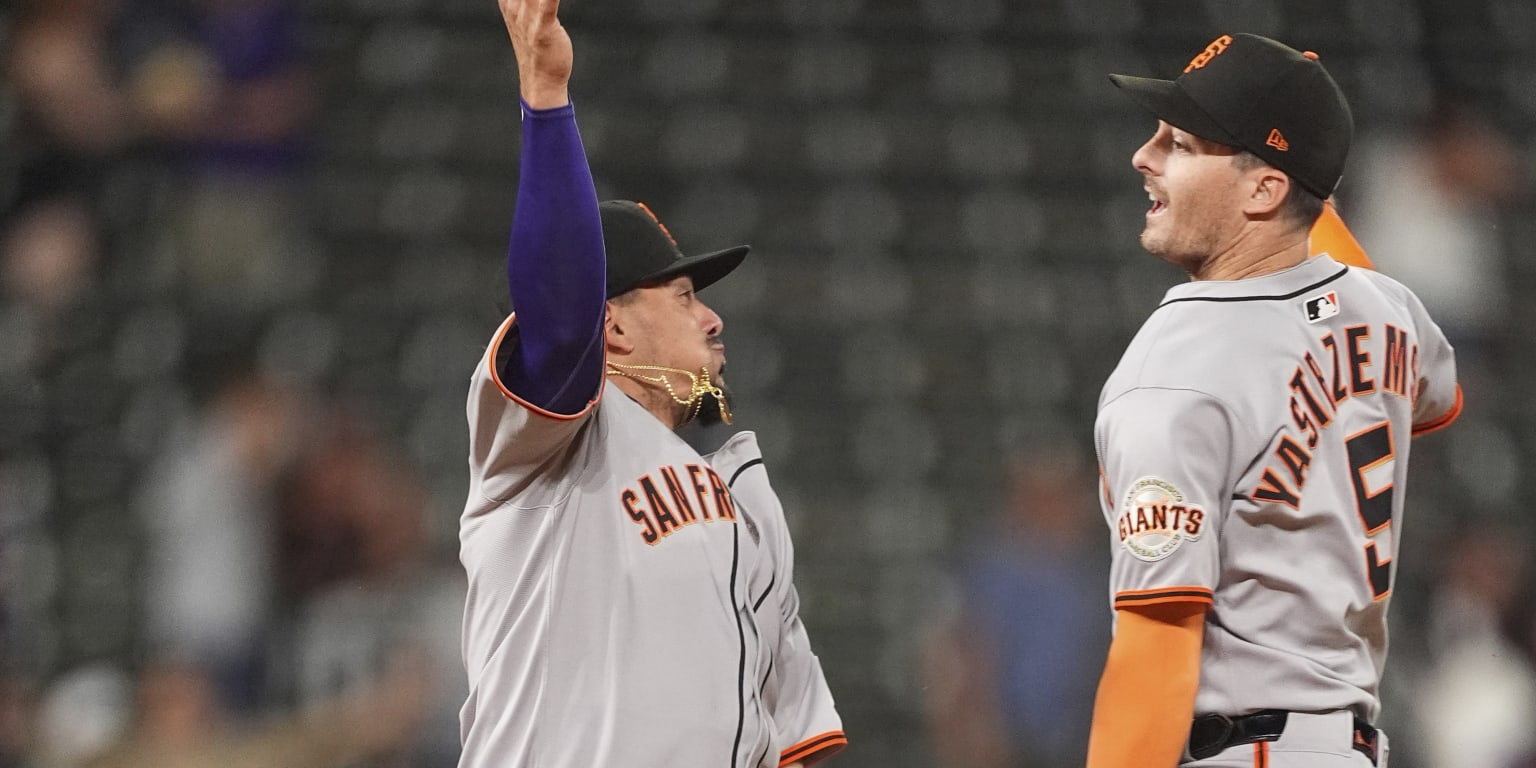 Giants rally for 4 runs in 9th to beat Rockies