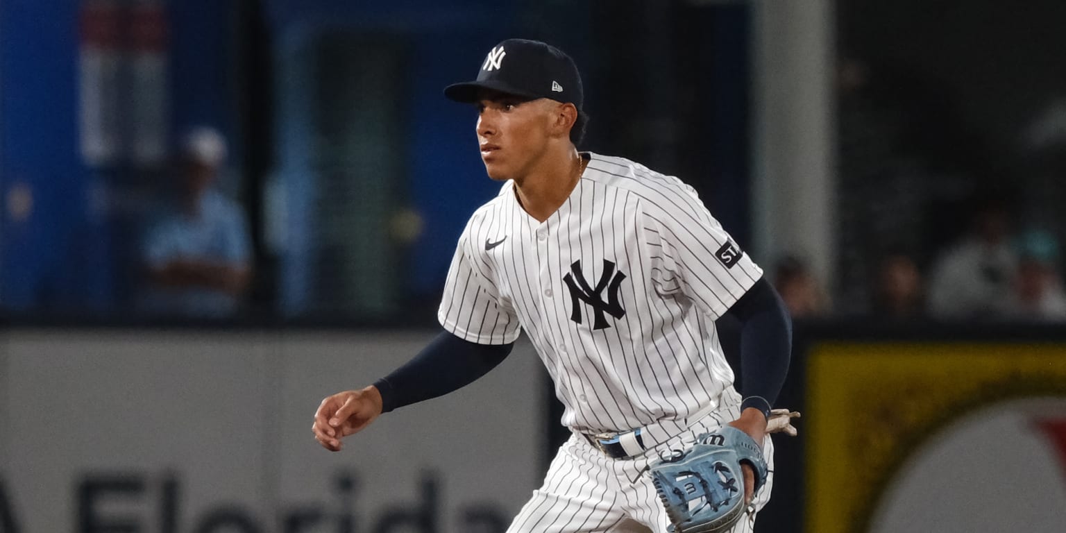 Yanks reassign top prospect Lombard to Minors camp