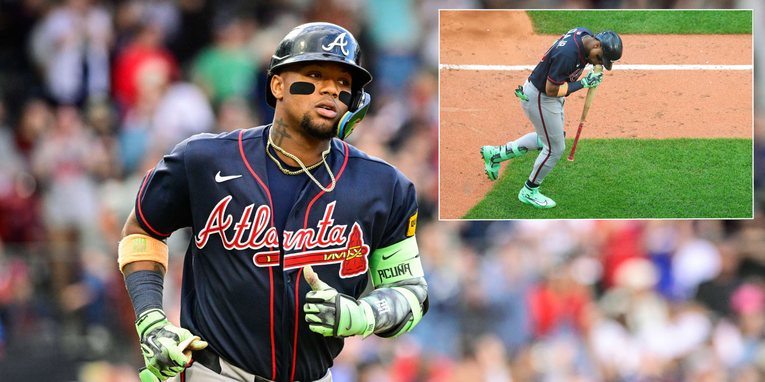 A slam and a smooch! Acuña kisses bat after clearing Green Monster