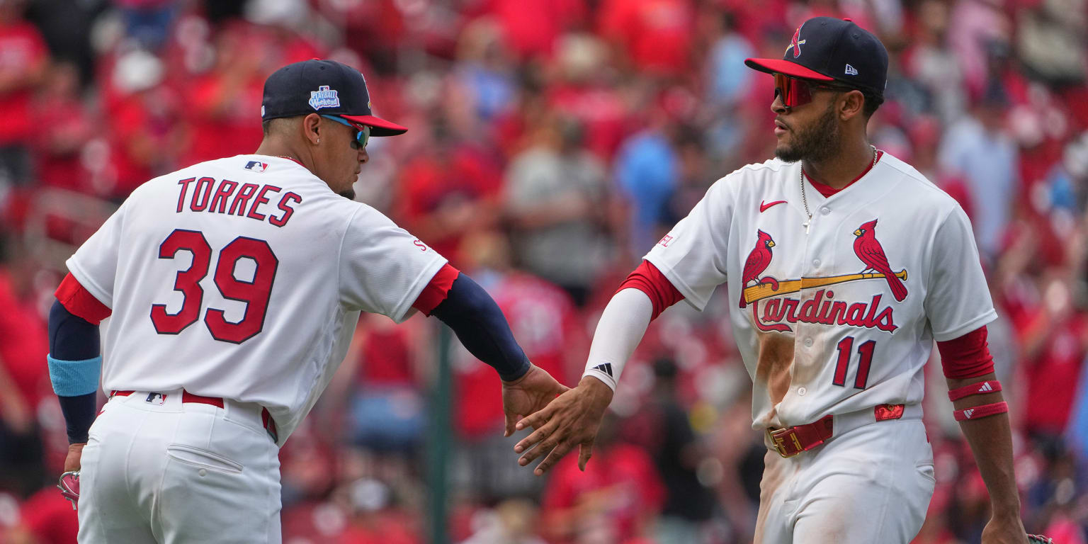 Cardinals cap sweep of Reds with another comeback win