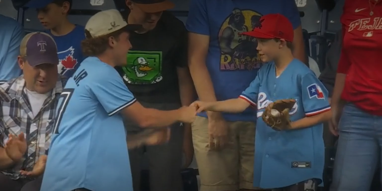 Sharing is caring: Toronto fan gives Langford HR ball to boy in Rangers jersey