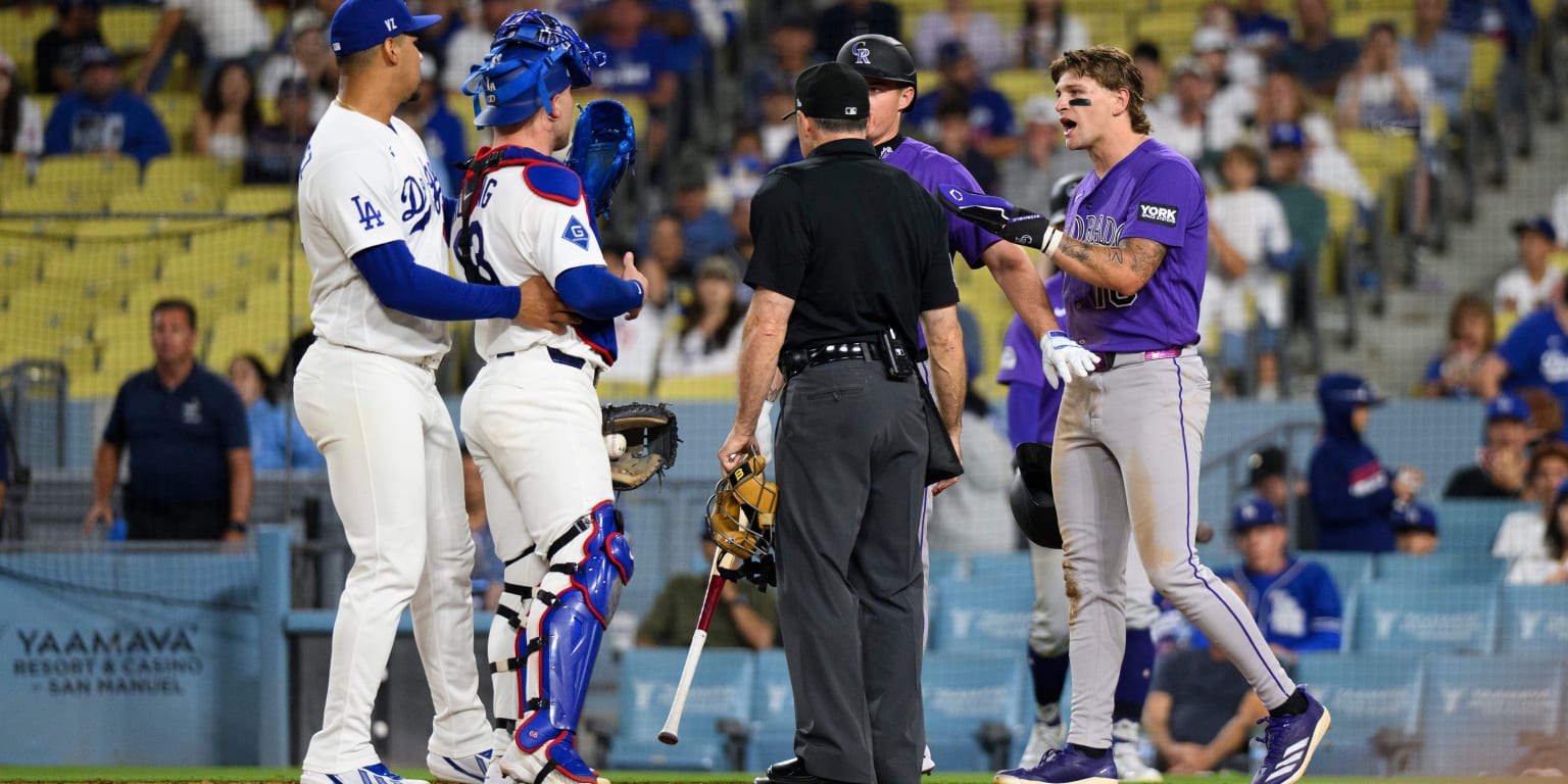 Dodgers, Rockies clear the air after benches empty following play at the plate