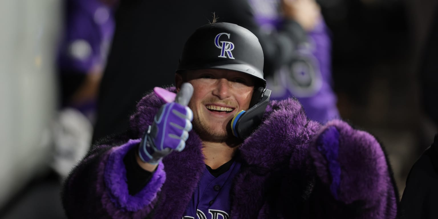 Goodman reaches 40-HR milestone, and Rockies want more