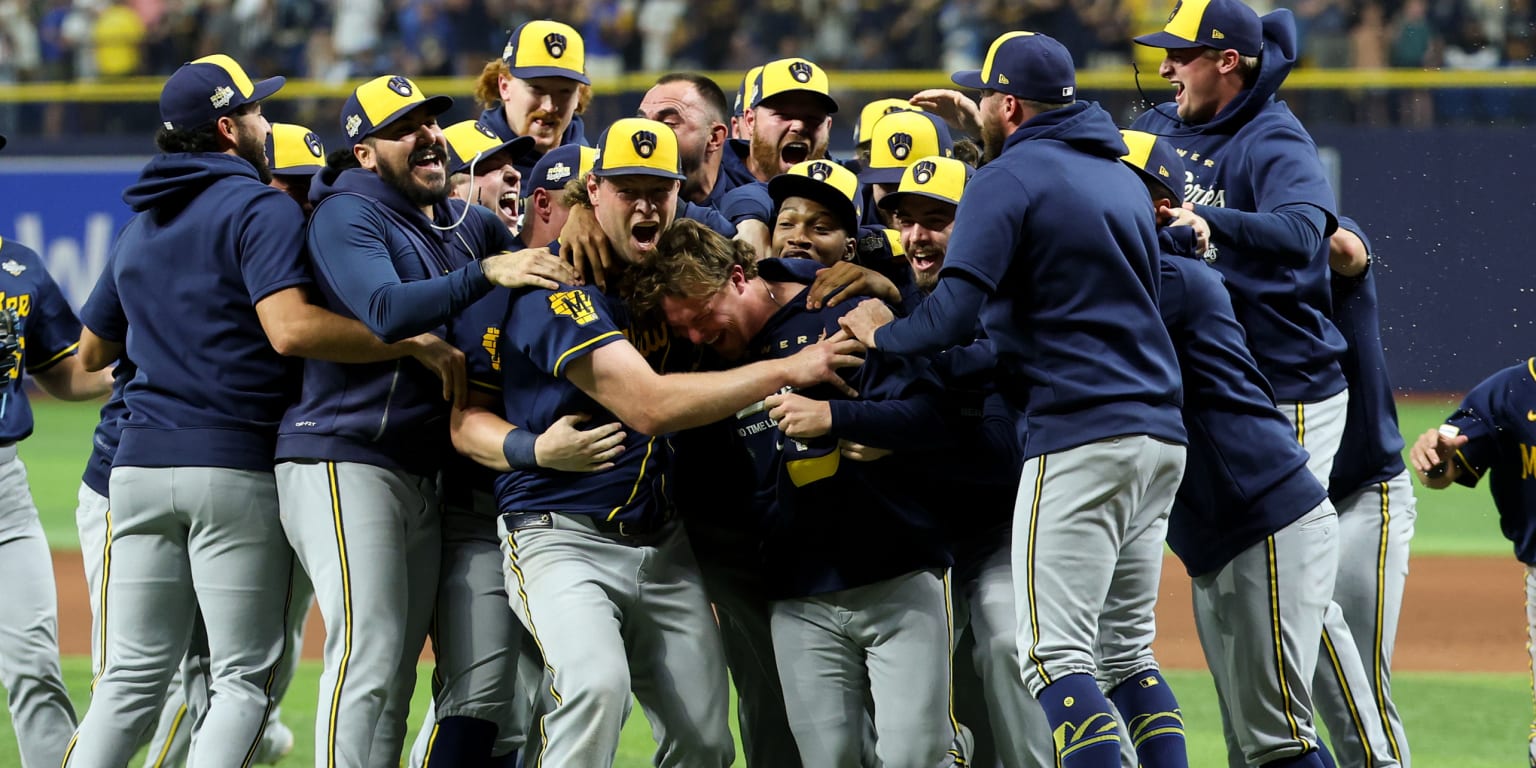 Brewers players gather in a celebratory championship huddle