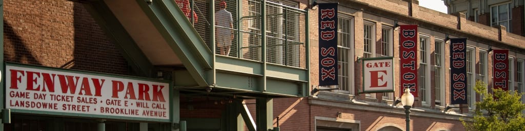 Clubhouse attendant packs up Red Sox gear, at Fenway - Digital Commonwealth