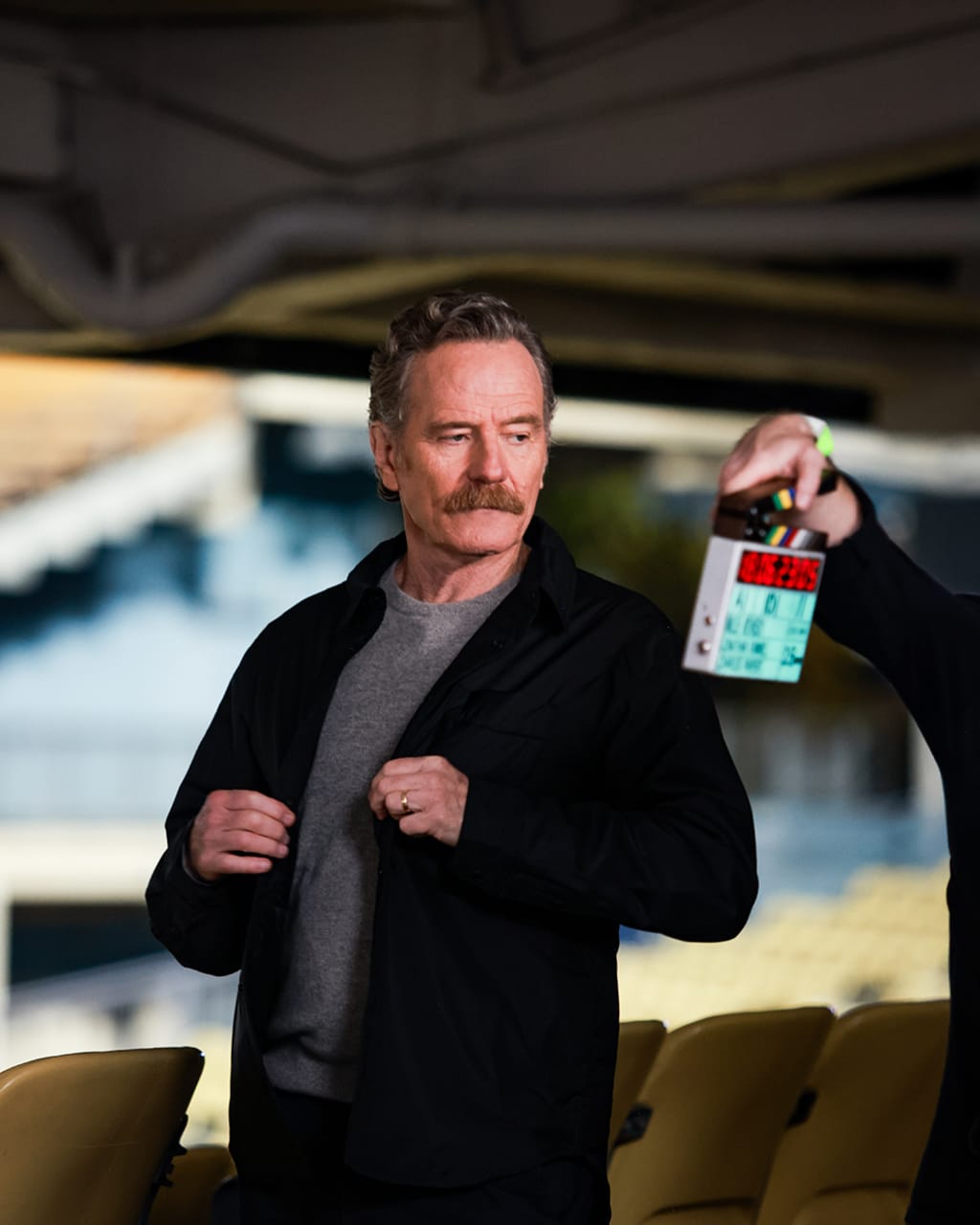 Bryan Cranston prepares to shoot a scene at Dodger Stadium. (Photos by Nicole Vasquez/MLB.com)