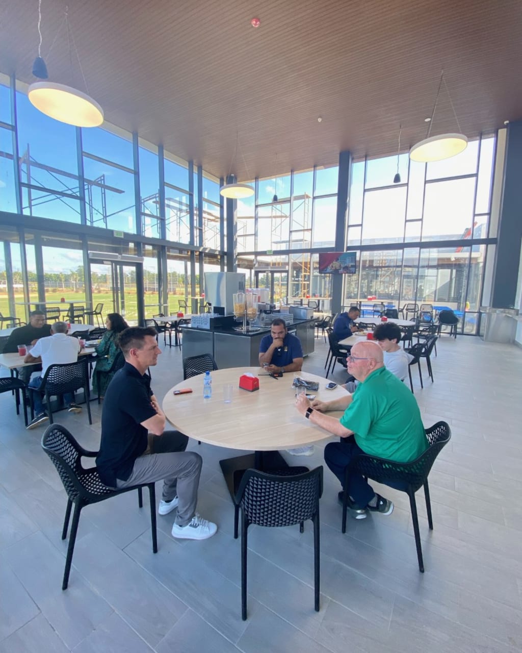 Manager Craig Counsell and Brewers vice president of baseball projects Gord Ash meet inside the Dominican academy in January.