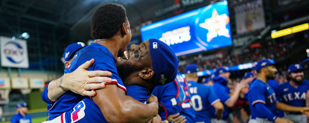Texas Rangers' Corey Seager, left, Jonah Heim, center, and Marcus Semien,  right, celebrate their win in a baseball game against the Minnesota Twins,  Friday, July 8, 2022, in Arlington, Texas. (AP Photo/Tony