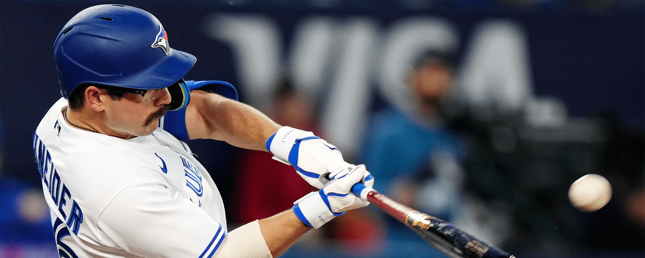 Toronto Blue Jays second baseman Davis Schneider (11) steams third