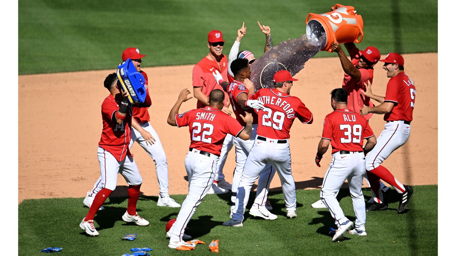 Washington Nationals' Trea Turner continues his slide as he scores during  the fifth inning of a baseball game against the Cincinnati Reds, Saturday,  June 24, 2017, in Washington. (AP Photo/Nick Wass Stock