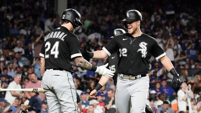 Chicago White Sox third baseman Ryan Goins (17) hold onto the ball