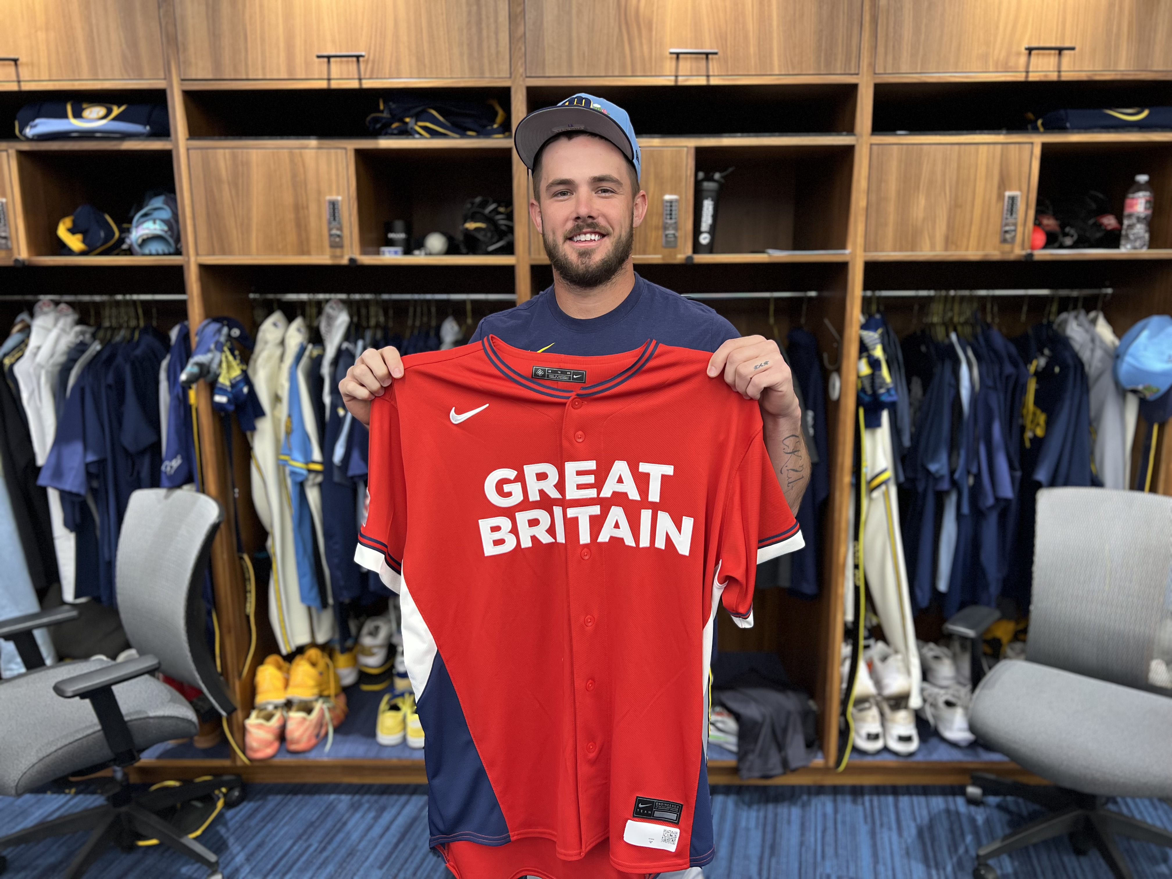 DL Hall holding a Great Britain jersey.