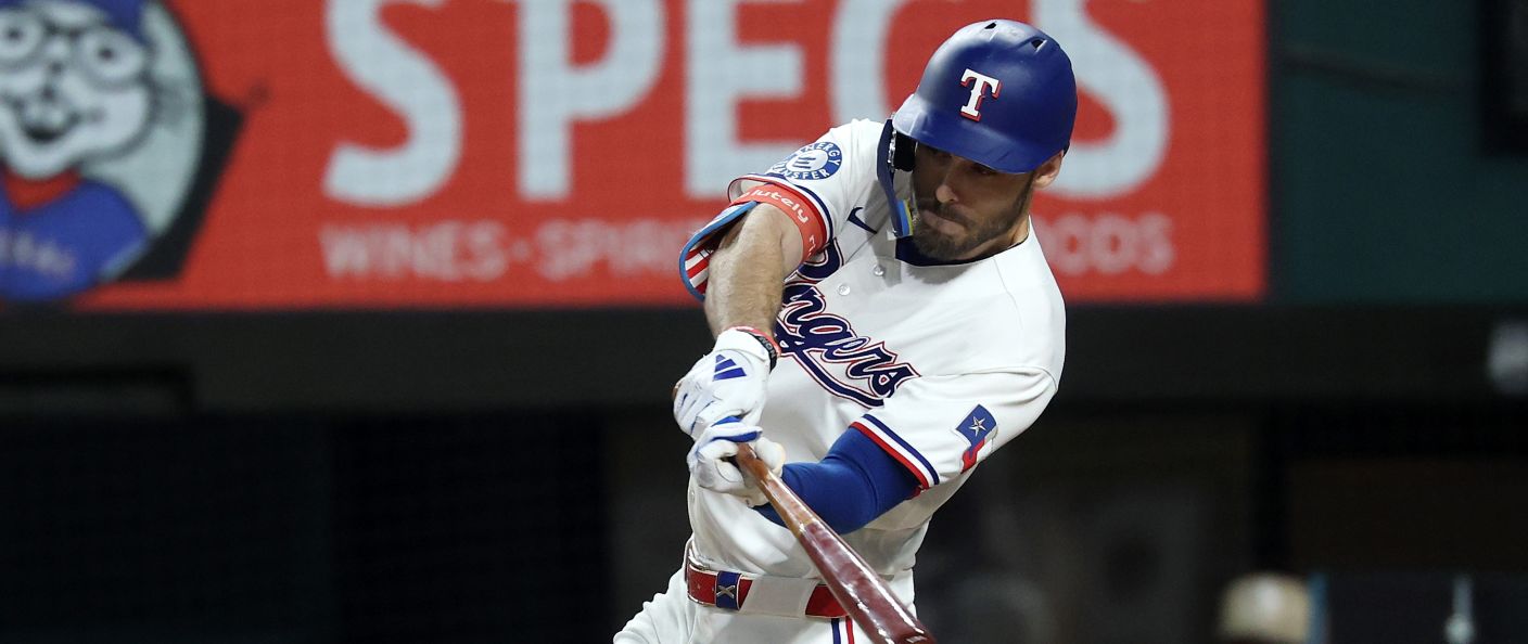 Action du match entre les Mets et les Rangers, au Globe Life Field.