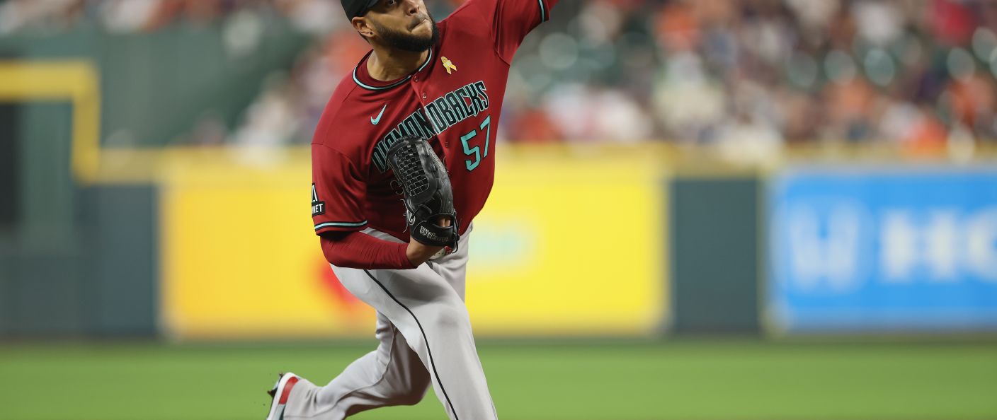 Action du match entre les Diamondbacks et les Astros, au Daikin Park.