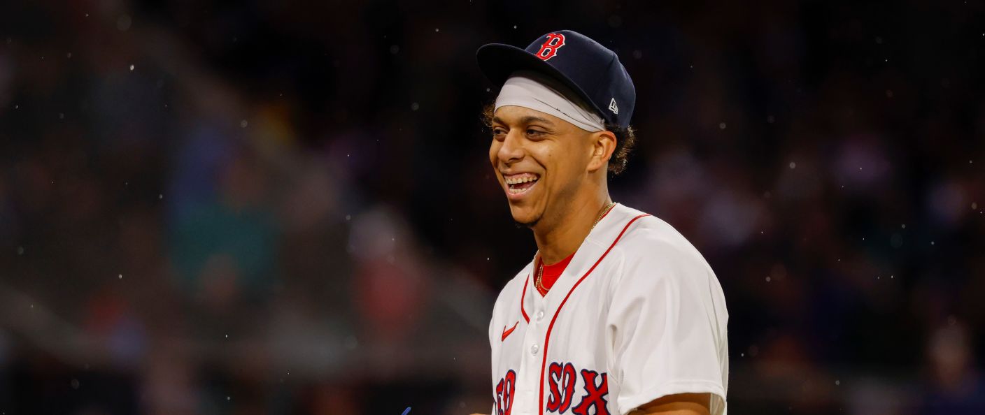 Action du match entre les Cubs et les Red Sox, au Fenway Park.