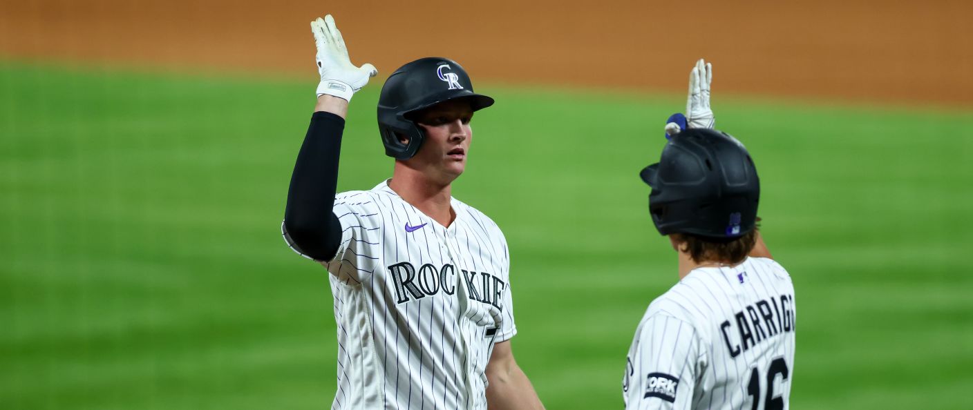 Action du match entre les Orioles et les Rockies, au Coors Field.