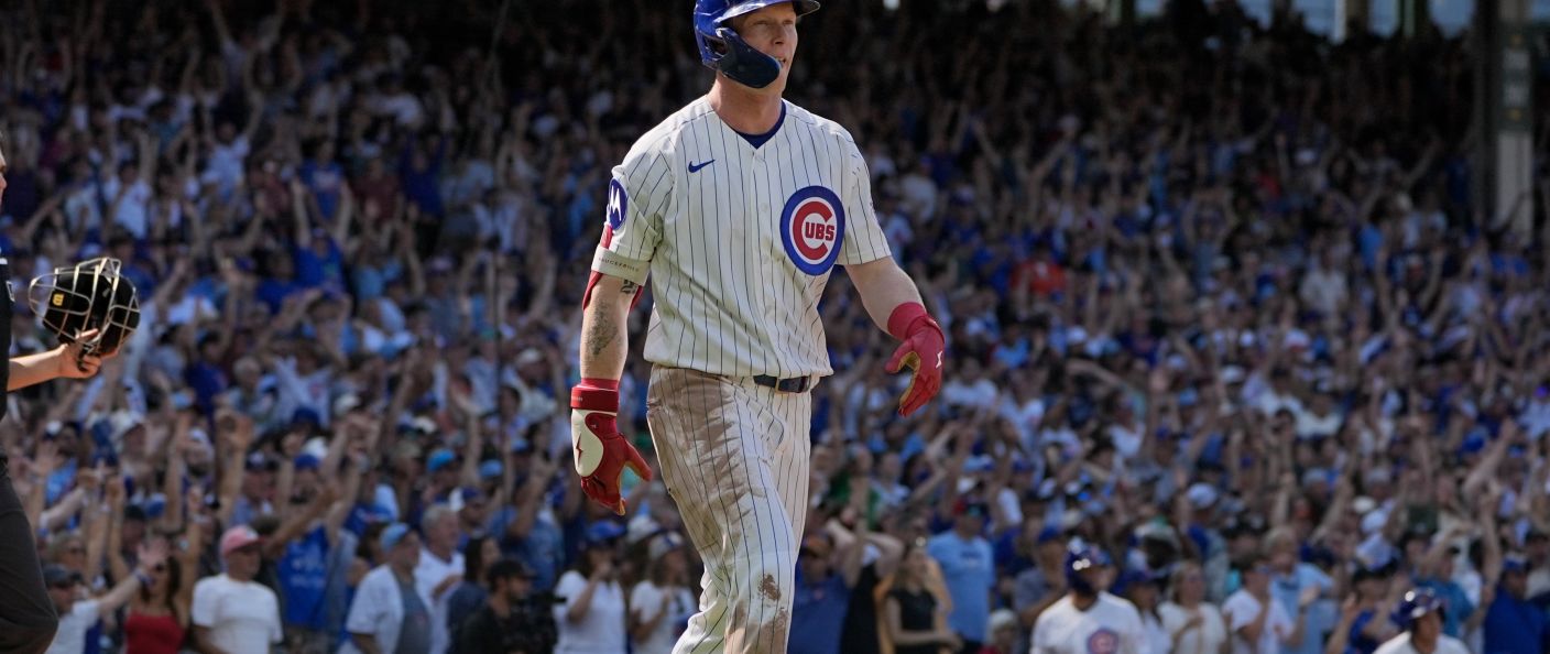Action du match Cubs - Giants au Wrigley Field.