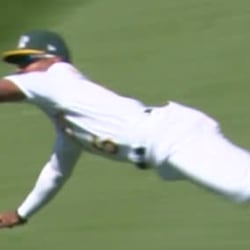 Tony Kemp is an awe of himself after making a diving catch 