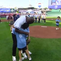 Watch Lorenzo Cain (and his kids) throw ceremonial first pitch to