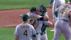 Oakland Athletics relief pitcher Zach Jackson celebrates after