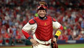 St. Louis Cardinals Yadier Molina is restrained by brother Bengie